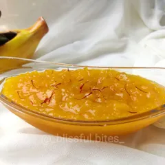 A serving of my traditional Aam ka Murabba, a sweet mango preserve. Made with raw mangoes and saffron, this is a classic summer delicacy that brings back fond memories.