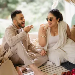 Love should be fun, and your photoshoot should be too. We believe in capturing the real you, whether that means sharing a pizza and laughing uncontrollably during a cozy indoor pre-wedding session. It’s these unscripted, joyful moments that tell your true story.