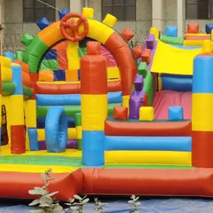 A uniquely designed inflatable castle with gear and wheel motifs. This model offers a different aesthetic for clients looking for something other than character themes.
