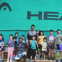 A happy moment with our junior players and coaches. We celebrate every step of their progress and foster a positive, encouraging environment.
