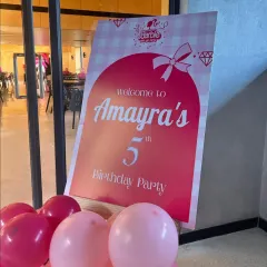 A charming welcome sign for a Barbie-themed 5th birthday. The personalized design, featuring the birthday girl's name, makes guests feel special from the moment they arrive.