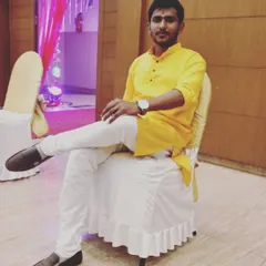 In traditional attire for an event. I always feel a sense of pride wearing a kurta, representing our culture.