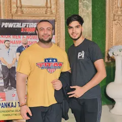 With a fellow powerlifter and national record holder. We are a community of strength.