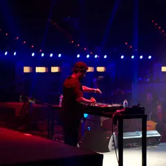 Adjusting the mix on a huge stage. Even in a large venue, my focus is on the fine details of the sound to ensure a perfect experience.