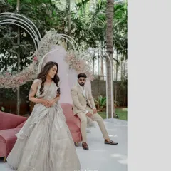 This shot captures the full elegance of the engagement decor. The bride's stunning outfit perfectly matches the sophisticated and modern theme I created for their special day.