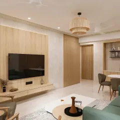We create warm and inviting living spaces perfect for family time. This living room showcases a Japandi-inspired design with natural wood tones, a comfortable green sofa, and soft, ambient lighting, proving that modern home interiors can also be cozy and welcoming.