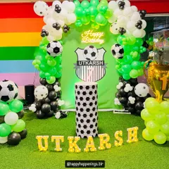 This one was extra special, planned for my own son, Utkarsh. We went all out with a football-themed party, complete with a custom backdrop, a cake pedestal that looks like a football, and marquee letters spelling out his name. Seeing his joy was everything.