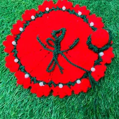 This special red poshak features the 'Ek Onkar' symbol crocheted in green. It is a heartfelt creation, perfect for celebrating Gurpurab or for any devotee who holds the symbol dear.