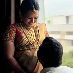 A sweet, intimate moment from Raji's baby shower. Her makeup is soft and radiant, ensuring she looks beautiful while feeling comfortable.
