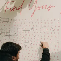 An interactive 'Find Your Name' word search puzzle for guests. We love creating fun and engaging activities that bring everyone together.