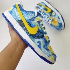 Holding the finished "Starry Night" Dunk. It's amazing to see how a classic piece of art history can be reimagined into modern, wearable art.