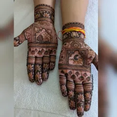 A Karwa Chauth design featuring the crescent moon. This pattern combines the moon with traditional jharokha and lotus motifs, perfect for the occasion.