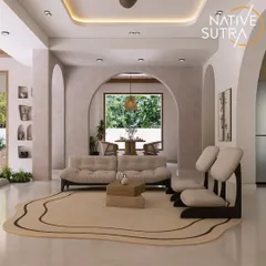 A wider view of the Mediterranean-inspired living room, showing the series of archways that create a soft, flowing transition between spaces. The irregularly shaped rug adds an organic, modern touch.