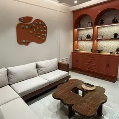 Here is a finished "Travel Diary" piece installed in a client's beautiful Mumbai home. This apple-shaped textured board holds dozens of miniature paintings, each one a memory from their family travels. It's a statement piece that's deeply personal.