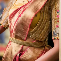 The front view of the hand-embellished bridal blouse, showing the intricate patterns and the flattering silhouette created by the detailed workmanship.