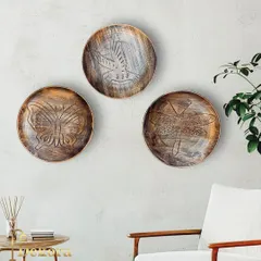 The subtle details and textures of these decorative plates make them a sophisticated addition to any wall.