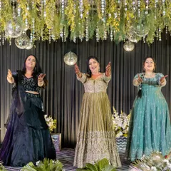 A choreographed dance with my girls. I styled complementary but distinct looks for my family, ensuring everyone felt confident and looked great on the stage.