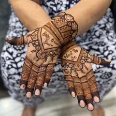 So much joy in this henna for a 'Nani to be'. This design celebrates the upcoming arrival of a new baby with sweet messages and heart-filled patterns.