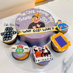 Could this cake BE any more perfect for a Friends fan? I designed this "The One Where You Turned 30" cake set, complete with a Central Perk theme, iconic quotes, and character toppers on the surrounding cupcakes.