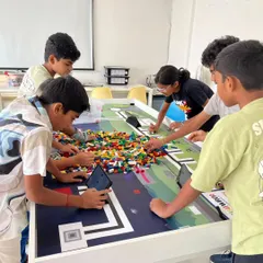 Teamwork makes the dream work. Our workshops are filled with collaborative energy as students gather to build, problem-solve, and prepare for challenges like the World Robot Olympiad. It's a fantastic environment for learning and making new friends.