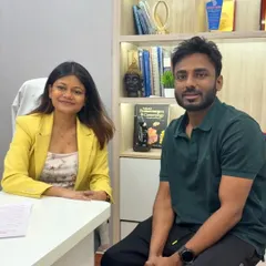 The consultation is a crucial first step. Here, I am discussing a personalized treatment plan with a patient to address his concerns about looking tired and achieve a refreshed appearance using dermal fillers.