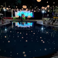 Imagine having your wedding reception here. This is one of my resort venues in Panvel with a stunning poolside stage setup, perfect for giving your event a destination wedding feel without leaving Navi Mumbai.