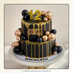 This black and gold two-tier cake is all about modern elegance. It's a 2kg Black Forest cake, but not the ordinary kind. I layer it with my own homemade cherry compote for a flavour that's as sophisticated as the design.