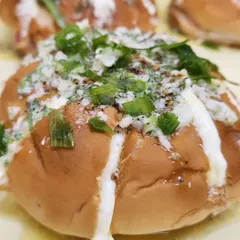 Our Korean Cheese Buns are a savory favorite. These soft buns are filled with cream cheese and topped with a savory garlic and herb butter, making them an irresistible treat for any office gathering.