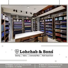 This is our fabric consultation area, where your bespoke journey begins. Surrounded by shelves of premium fabrics, you can take your time to select the material for your custom-made suit or shirt.