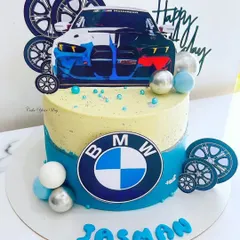 Luxury on wheels, sweetness on plates. A BMW masterpiece in cake form for the ultimate car lover.
