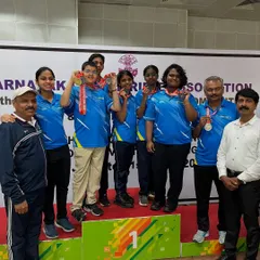 Our team of new shooters on the podium, celebrating their first big win and 15-medal haul.