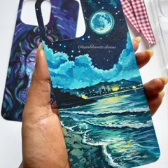 This custom-painted beach scene is one of my absolute favorites. I used acrylics on black paper to capture the glow of the city lights on the water, creating a moody and beautiful piece of art that you can carry with you.