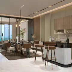 The open plan layout of the Chattarpur farmhouse integrates the dining and bar area with the living space. This encourages social interaction while maintaining distinct functional zones.