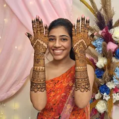 That beautiful, happy smile says it all. It's a joy to see my brides so happy with their finished henna.