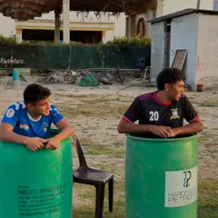 Two players cooling down in ice baths. The hard work is done, and now it's time to recover and prepare for the next challenge together.