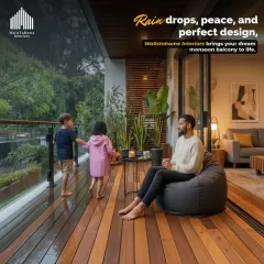 A perfect family space extends to the balcony. We designed this area with durable wooden decking and comfortable seating, creating a seamless indoor-outdoor experience for peaceful monsoon evenings.