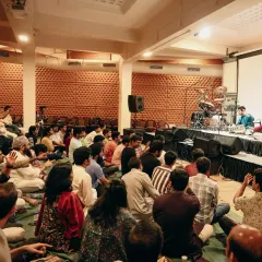 A wide view from a Gurupurnima celebration performance. Seeing an audience, young and old, sitting together and absorbed in the music is an incredibly humbling and motivating experience.