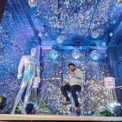 To add to the futuristic vibe of the sangeet party, I included a life-sized mannequin covered in mirror pieces, which reflects the disco balls and sequin walls.