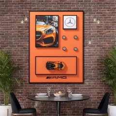 Our Mercedes AMG shadow box is a showstopper, especially against an industrial brick wall. The pop art style, vibrant orange, and 3D car model make it a perfect piece for a dining area, office, or entertainment space.