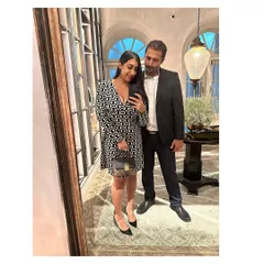 A mirror selfie capturing us, partners in life and at work. Our journey together is the foundation of our firm's collaborative and resilient spirit.