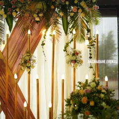 This is another angle of our elegant stage decor, showing how the floral arrangements and lighting come together. We focus on every detail to ensure the final look is perfect.