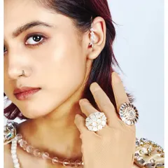 A successful jewellery shoot is all about the details. This close-up was lit to make every facet of the rings and the delicate ear cuff sparkle. The focus is entirely on the craftsmanship of the pieces, making it perfect for a brand lookbook or commercial campaign.