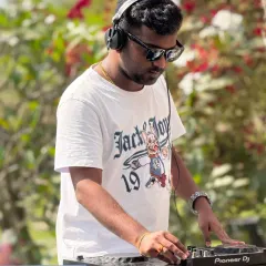 Another look at me working the Pioneer DJ decks. Having reliable, industry-standard equipment means I can focus on creativity and performance.