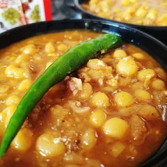 Maangsher Ghugni, a yellow pea curry spiked with minced mutton, is a robust snack I first tasted at the Kolkata Book Fair. I love drumming up that nostalgia in my kitchen for you to enjoy.