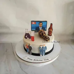 A cake decorated with all of dad's favorite things. This personal design includes his favorite TV show, food, drink, and pictures of his family.