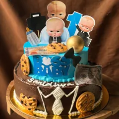 This two-tier Boss Baby themed cake was so much fun to create for a first birthday party. I specialize in fondant-free designs, using buttercream and custom toppers to bring any theme to life for your little one's big day.