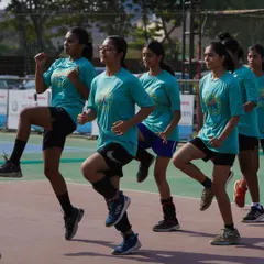 Young athletes performing synchronized warm-up drills. Discipline and coordination are fundamental skills we teach in our youth programs.