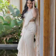 A candid shot that captures the light, airy feel of the outfit and the fresh, natural makeup.
