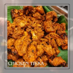 A platter of our signature Chicken Tikka, fresh off the grill. This dish is a guaranteed crowd-pleaser at weddings, corporate events, and festive parties.