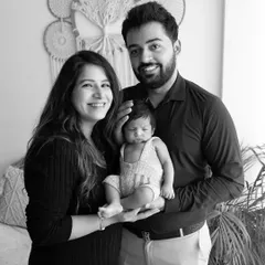 A classic family portrait in black and white. This style never goes out of fashion and creates a truly timeless memory for the family.